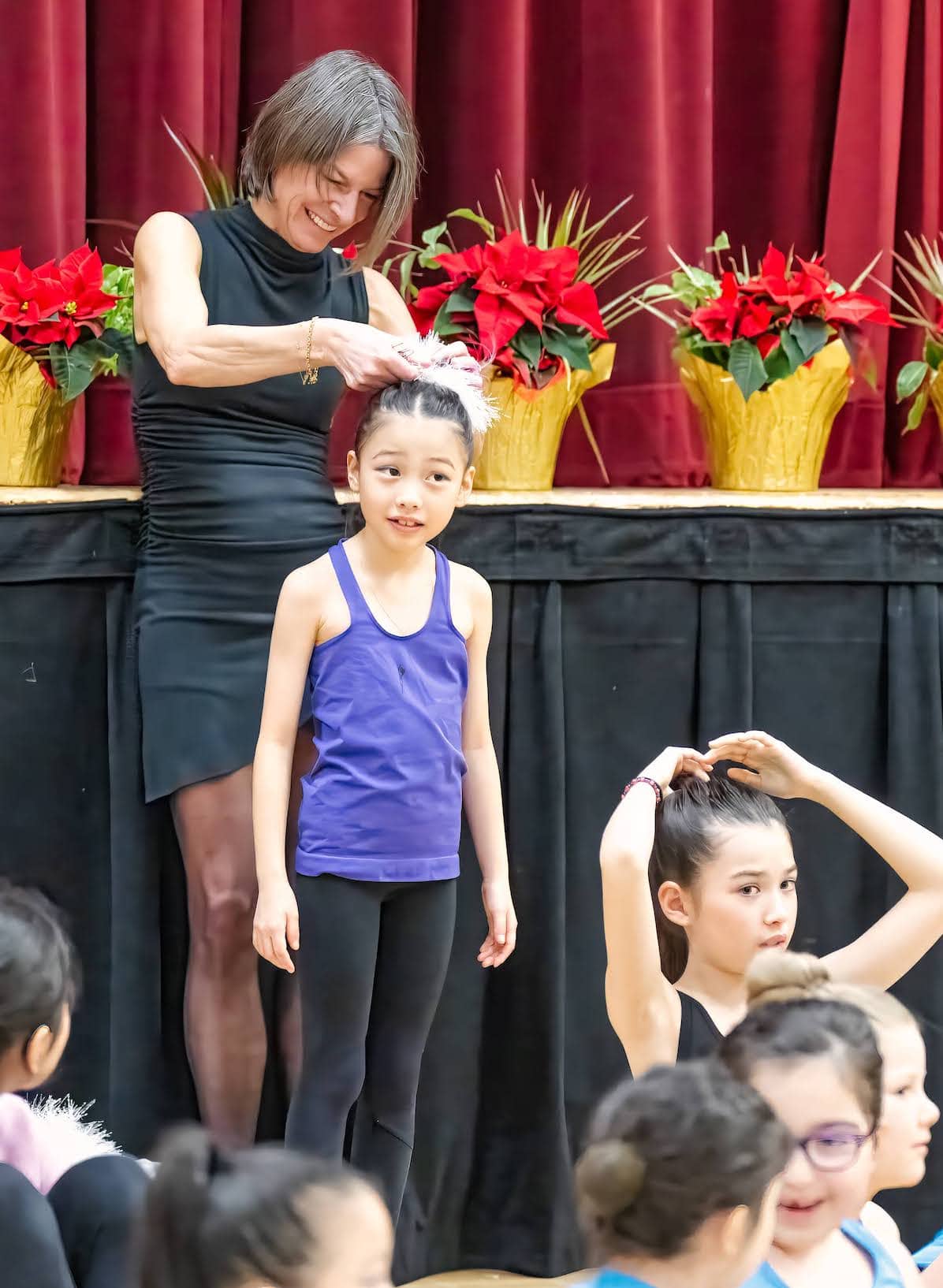 Coach Gwyn coaching gymnastics