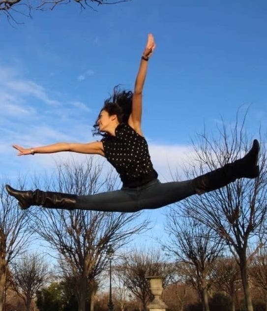 Coach Mimi with gymnasts